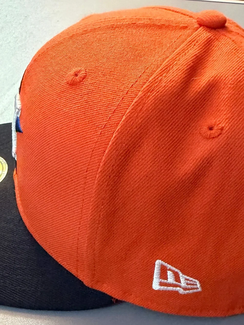 New Era Orange Crown Navy Brim Fitted Hat with White & Blue Logo